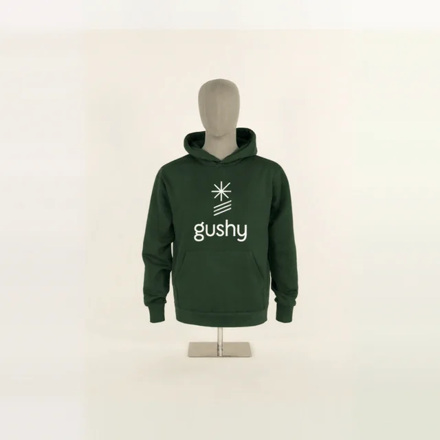 Forest-green gushy hoodie with the white logo on the chest